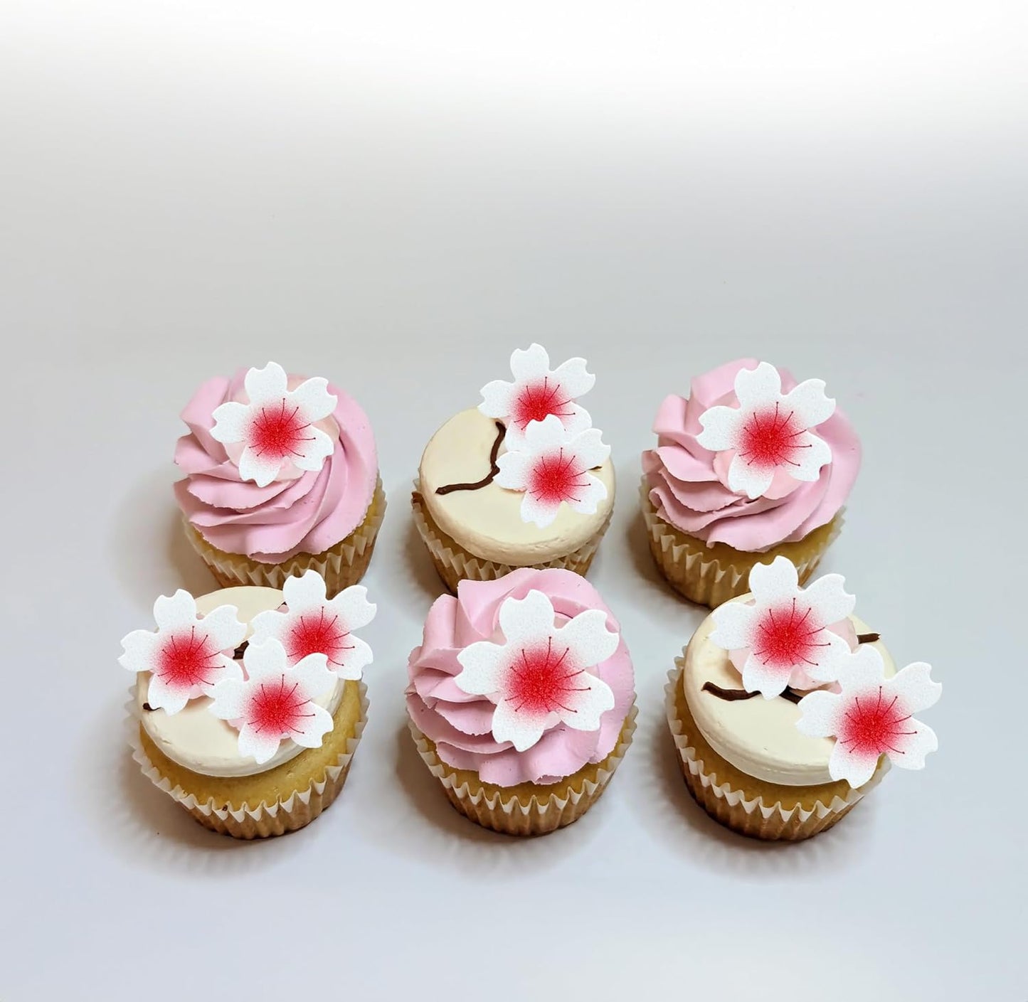 Ephlyn 100Pcs Edible Cherry Blossom Cupcake Toppers Edible Wafer Paper Flowers for Spring Bridal Engagement Baby Shower Birthday Party Cupcake Picks Anniversary Party Decorations Supplies
